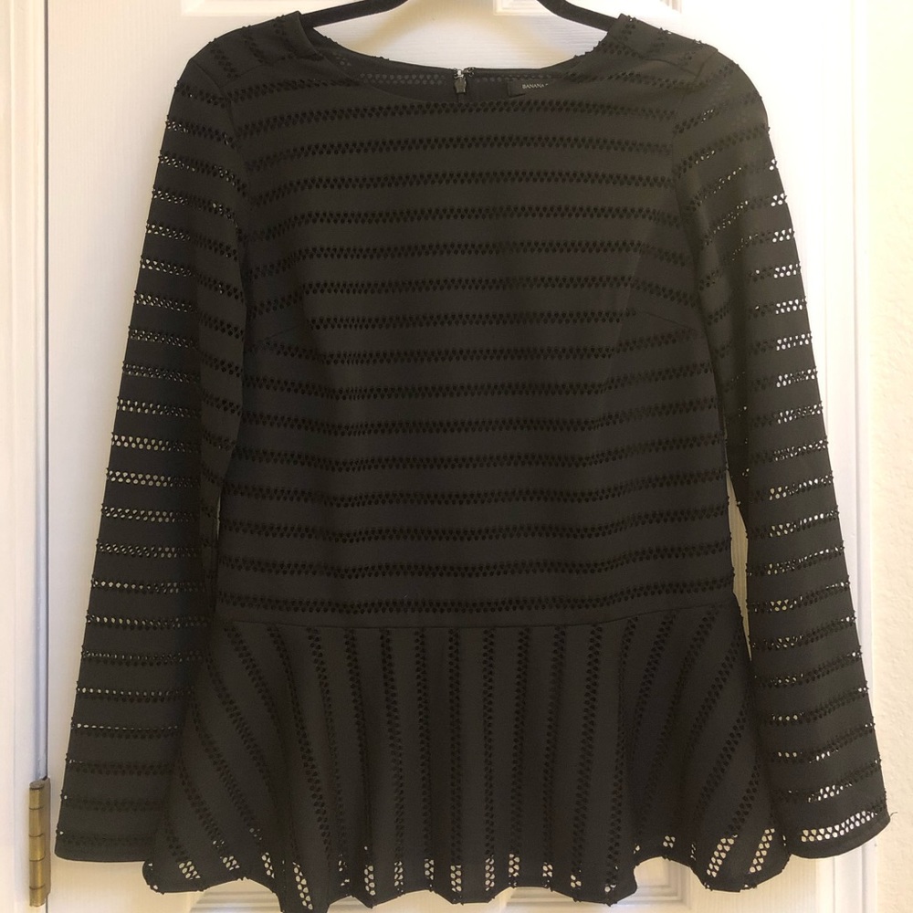 Black eyelet peplum top